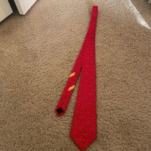 Vintage red tie with pocket watch pattern